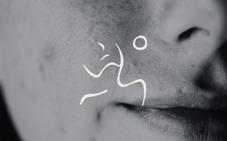 Zoom sur peau irritée et le pictogramme visage