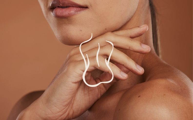 Zoom brut sur la peau d'une femme et un pictogramme de corps